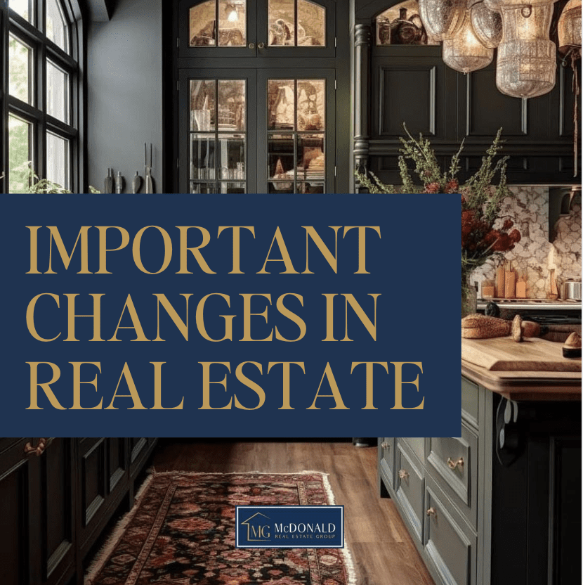Important Changes in Real Estate text on a image of a dark kitchen